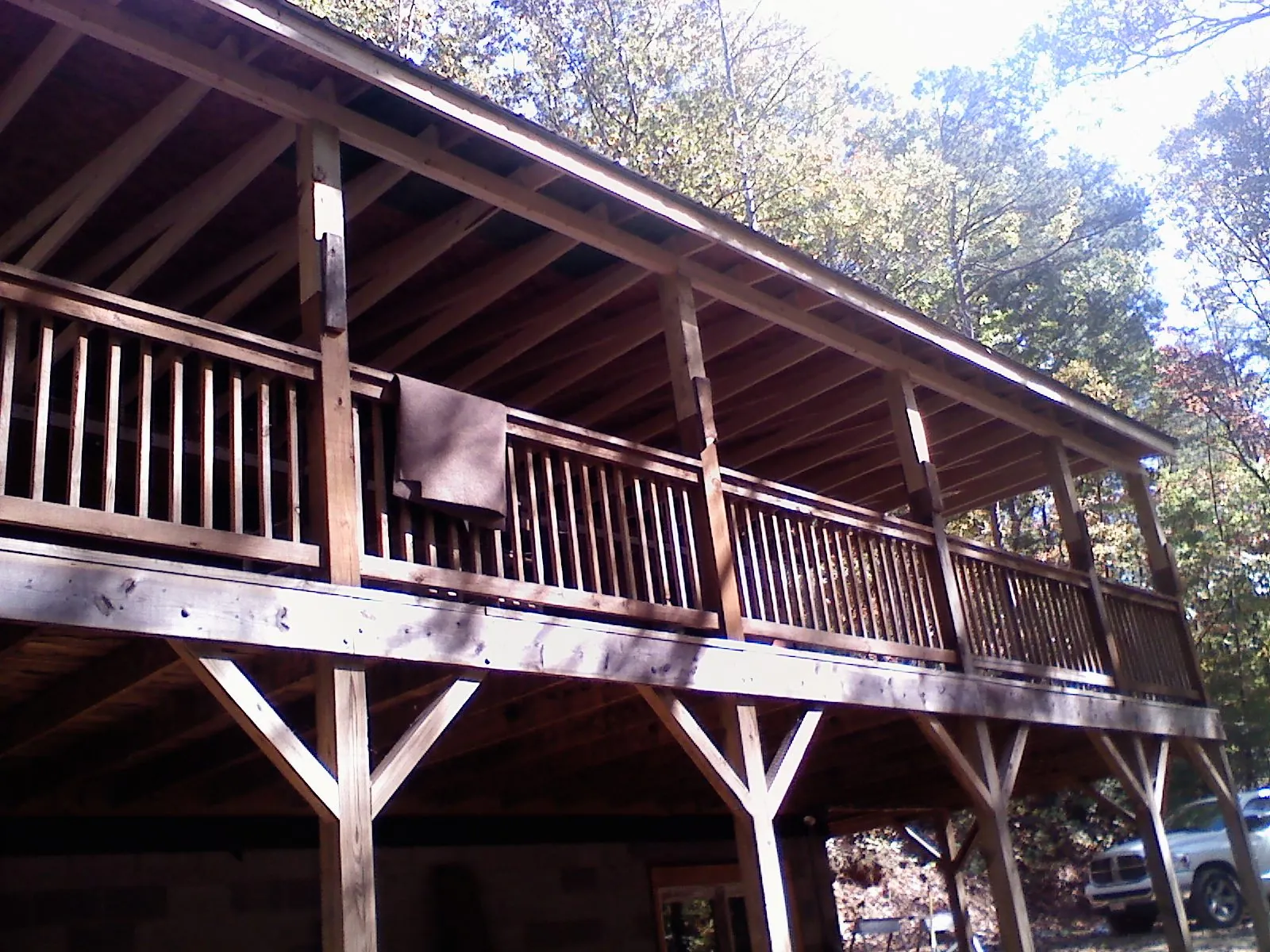 Timber framing under a new elevated porch and deck — Roof Leak Repair in East Killingly by Roofing Brothers